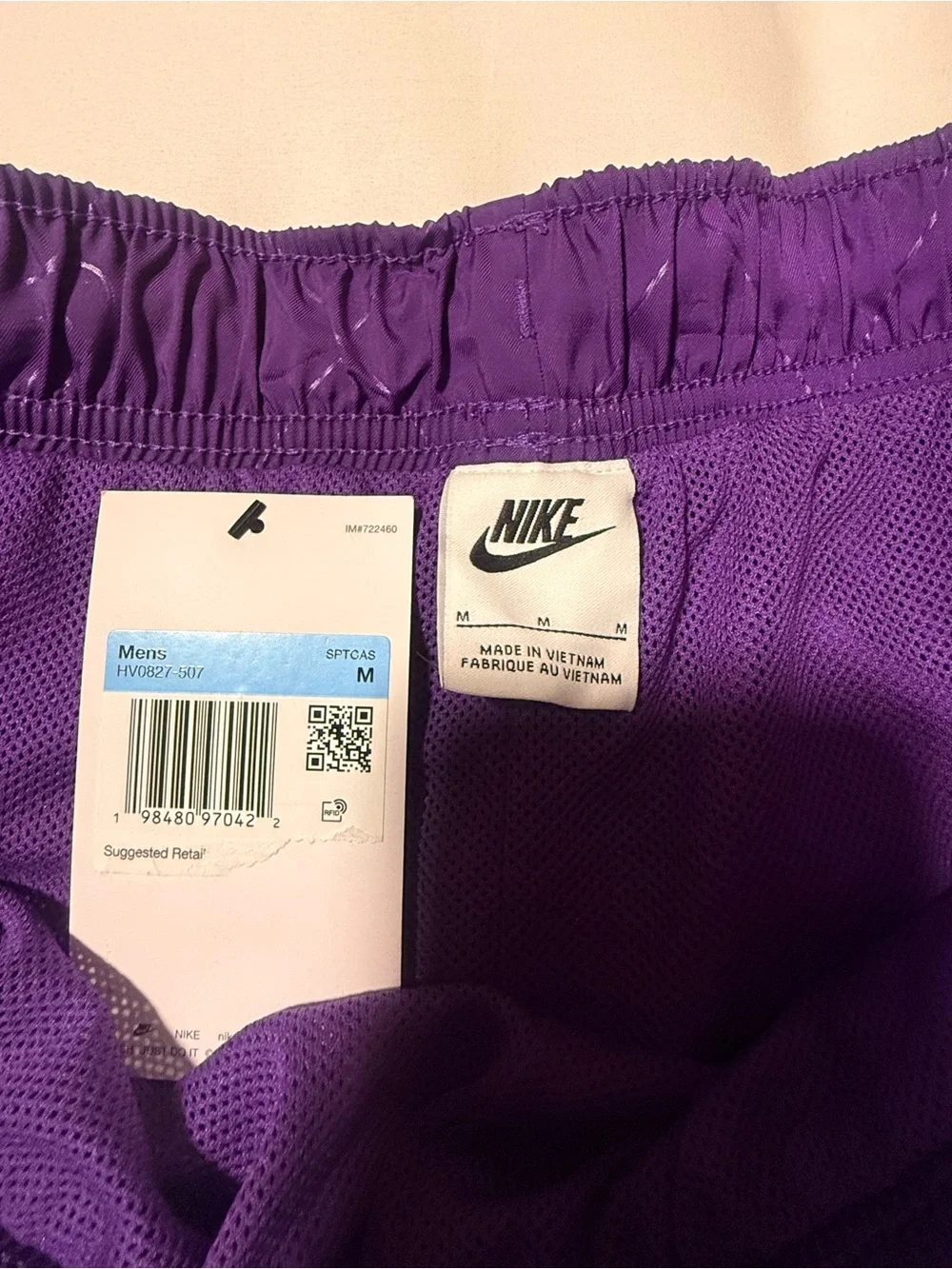 Nike Men's Purple Athletic Shorts with Subtle Logo Pattern
